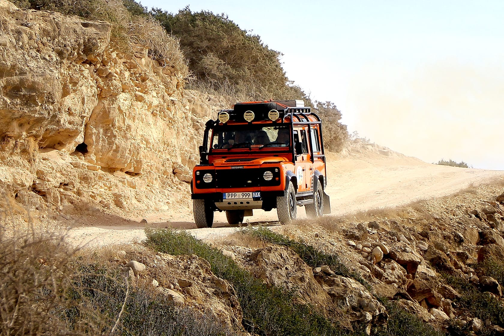 Four-wheel drive vehicle on an unsealed outback road